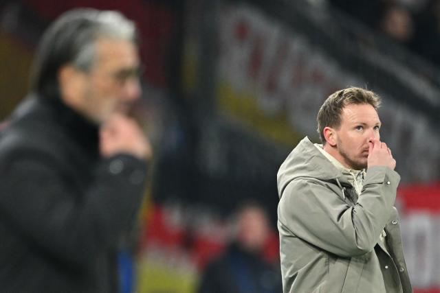 Germany's headcoach Julian Nagelsmann (R) reacts during the international friendly football match between Switzerland and Germany at St.Jakob-Park in Basel, Switzerland on March 27, 2026. (Photo by Fabrice COFFRINI / AFP)