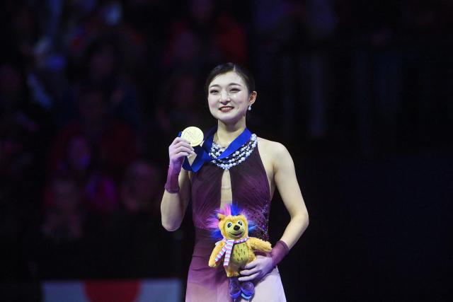Gold-medal winner Japan's Kaori Sakamoto celebrates after winning the women's free skating program of the 2026 ISU Figure Skating World Championships in Prague, Czech Republic on March 27, 2026. (Photo by Michal Cizek / AFP)