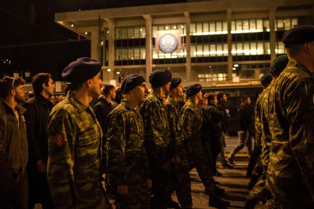 Greek soldiers take part in a rally to protest against Greek military spendings and the country’s involvement in the war in Iran, in Athens, on March 27, 2026. (Photo by Angelos TZORTZINIS / AFP)