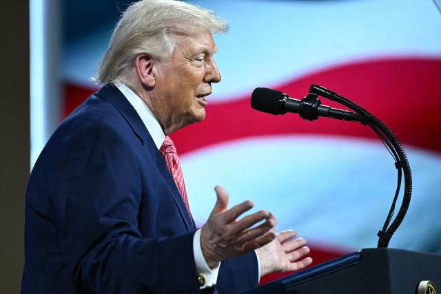 US President Donald Trump speaks during the Future Investment Initiative (FII) Summit in Miami Beach, Florida, on March 27, 2026. (Photo by Mandel NGAN / AFP)