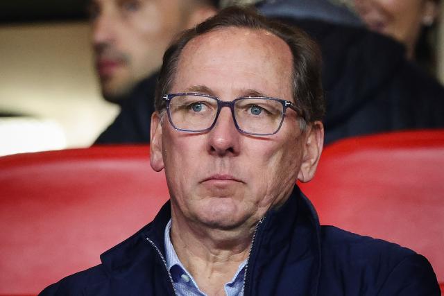 (FILES) Olympique Lyonnais' (OL) US President John Textor looks on from the stands prior to the French L1 football match between AS Monaco and Olympique Lyonnais (OL) at the Louis II Stadium (Stade Louis II) in the Principality of Monaco on May 10, 2025. The holding company Eagle Bidco, majority shareholder of Olympiaue Lyonnais, has been placed under judicial administration, the British firm Cork Gully announced on March 27, 2026, a development that sidelines American John Textor, the former president of the Lyon club. (Photo by CLEMENT MAHOUDEAU / AFP)