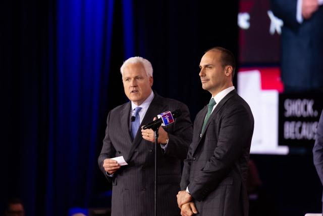 Son of former Brazilian President Jair Bolsonaro, Eduardo Bolsonaro (R), listens to questions during the Conservative Political Action Conference (CPAC) in Grapevine, Texas, on March 27, 2026. American conservatives converge on Texas this week for what organizers bill as their largest and most influential gathering, with the Iran war and fears of a punishing midterm election cycle heightening the stakes. (Photo by Leandro Lozada / AFP)