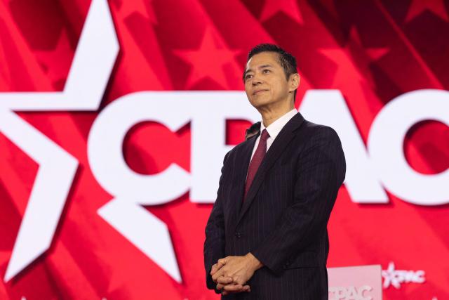 Japanese conservative political commentator Hiroaki Aeba stands on the main stage during the Conservative Political Action Conference (CPAC) in Grapevine, Texas, on March 27, 2026. American conservatives converge on Texas this week for what organizers bill as their largest and most influential gathering, with the Iran war and fears of a punishing midterm election cycle heightening the stakes. (Photo by Leandro Lozada / AFP)