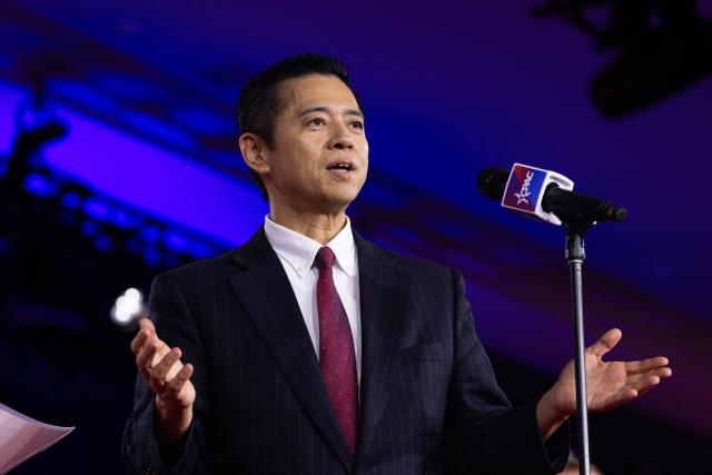 Japanese conservative political commentator Hiroaki Aeba speaks on the main stage during the Conservative Political Action Conference (CPAC) in Grapevine, Texas, on March 27, 2026. American conservatives converge on Texas this week for what organizers bill as their largest and most influential gathering, with the Iran war and fears of a punishing midterm election cycle heightening the stakes. (Photo by Leandro Lozada / AFP)
