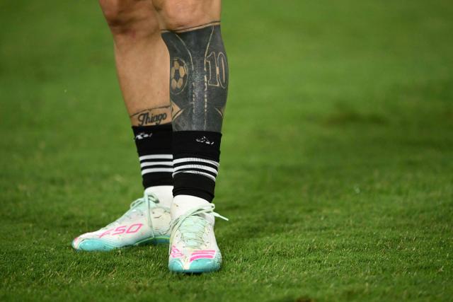 Argentina's forward #10 Lionel Messi's left leg tattoo is pictured before a friendly football match between Argentina and Mauritania at La Bombonera stadium in Buenos Aires on March 27, 2026. (Photo by Luis ROBAYO / AFP)