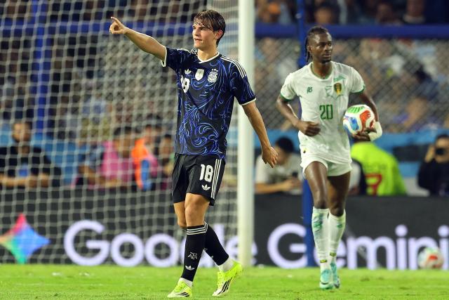 Argentina's midfielder #18 Nico Paz celebrates scoring his team's second goal during a friendly football match between Argentina and Mauritania at La Bombonera stadium in Buenos Aires on March 27, 2026. (Photo by ALEJANDRO PAGNI / AFP)