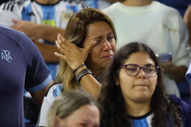 A fan of Argentina cries ahead of a friendly football match between Argentina and Mauritania at La Bombonera stadium in Buenos Aires on March 27, 2026. (Photo by ALEJANDRO PAGNI / AFP)
