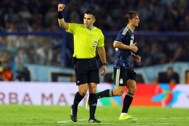 Paraguayan referee Derlis Lopez gestures during a friendly football match between Argentina and Mauritania at La Bombonera stadium in Buenos Aires on March 27, 2026. (Photo by ALEJANDRO PAGNI / AFP)