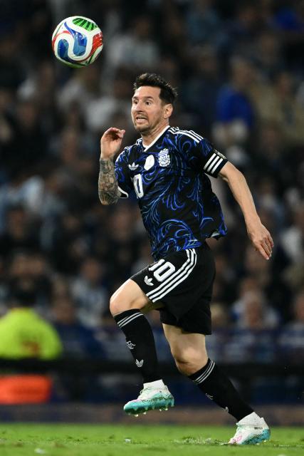 Argentina's forward #10 Lionel Messi runs for the ball during a friendly football match between Argentina and Mauritania at La Bombonera stadium in Buenos Aires on March 27, 2026. (Photo by Luis ROBAYO / AFP)