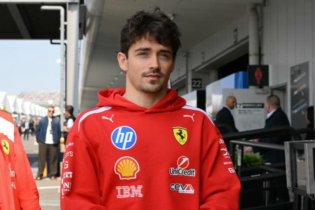 Ferrari's Monegasque driver Charles Leclerc arrives for the third practice session ahead of the Formula One Japanese Grand Prix at the Suzuka circuit in Suzuka, Mie prefecture on March 28, 2026. (Photo by Toshifumi KITAMURA / AFP)