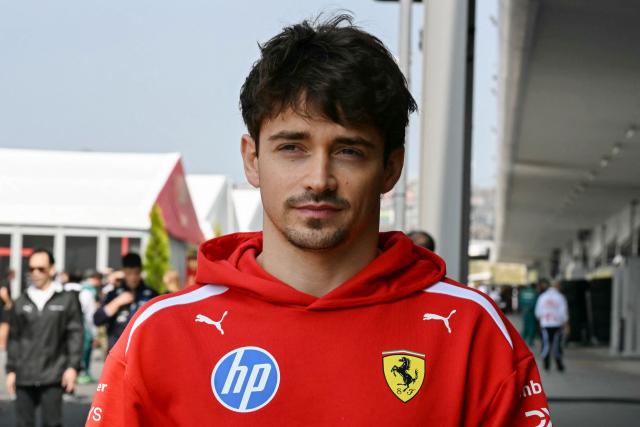 Ferrari's Monegasque driver Charles Leclerc arrives for the third practice session ahead of the Formula One Japanese Grand Prix at the Suzuka circuit in Suzuka, Mie prefecture on March 28, 2026. (Photo by Toshifumi KITAMURA / AFP)