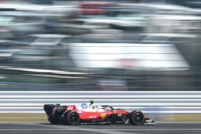 Ferrari's British driver Lewis Hamilton drives during the third practice session ahead of the Formula One Japanese Grand Prix at the Suzuka circuit in Suzuka, Mie prefecture on March 28, 2026. (Photo by ANDREW CABALLERO-REYNOLDS / AFP)