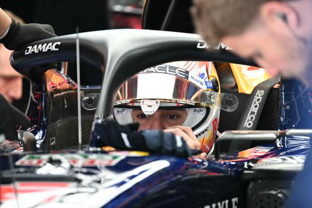 Red Bull Racing's French driver Isack Hadjar sits in his car during the third practice session ahead of the Formula One Japanese Grand Prix at the Suzuka circuit in Suzuka, Mie prefecture on March 28, 2026. (Photo by Toshifumi KITAMURA / AFP)