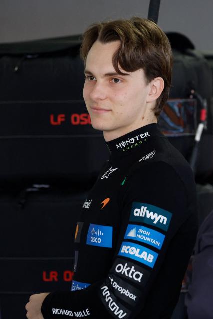 McLaren's Australian driver Oscar Piastri stands in the garage before the qualifying session ahead of the Formula One Japanese Grand Prix at the Suzuka circuit in Suzuka, Mie prefecture on March 28, 2026. (Photo by FRANCK ROBICHON / POOL / AFP)