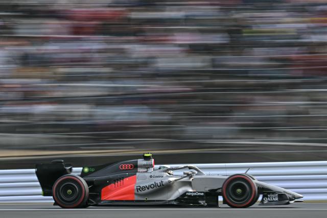 Audi's Brazilian driver Gabriel Bortoleto drives during the qualifying session ahead of the Formula One Japanese Grand Prix at the Suzuka circuit in Suzuka, Mie prefecture on March 28, 2026. (Photo by Philip FONG / AFP)