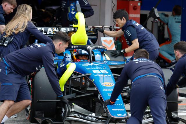Williams' Spanish driver Carlos Sainz makes a pit stop during the qualifying session ahead of the Formula One Japanese Grand Prix at the Suzuka circuit in Suzuka, Mie prefecture on March 28, 2026. (Photo by FRANCK ROBICHON / POOL / AFP)