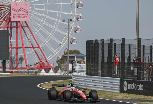 Ferrari's British driver Lewis Hamilton drives during the qualifying session ahead of the Formula One Japanese Grand Prix at the Suzuka circuit in Suzuka, Mie prefecture on March 28, 2026. (Photo by ANDREW CABALLERO-REYNOLDS / AFP)