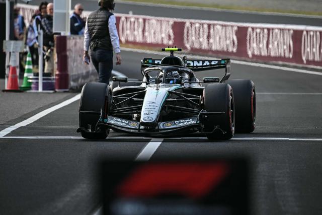 Mercedes' Italian driver Kimi Antonelli parks his car after the qualifying session ahead of the Formula One Japanese Grand Prix at the Suzuka circuit in Suzuka, Mie prefecture on March 28, 2026. (Photo by Philip FONG / AFP)