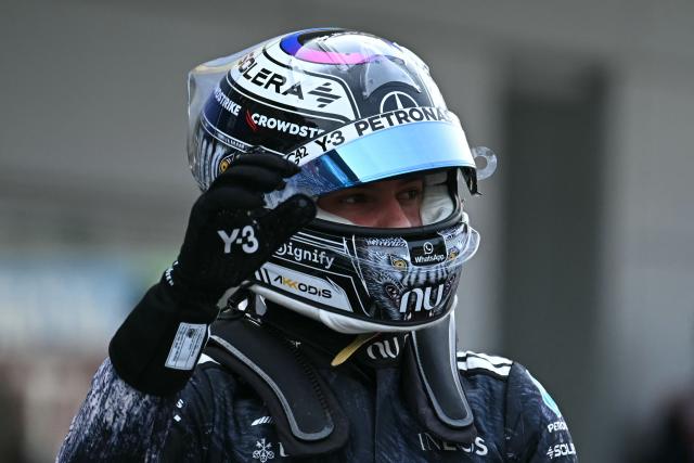 Mercedes' Italian driver Kimi Antonelli reacts after the qualifying session ahead of the Formula One Japanese Grand Prix at the Suzuka circuit in Suzuka, Mie prefecture on March 28, 2026. (Photo by Philip FONG / AFP)