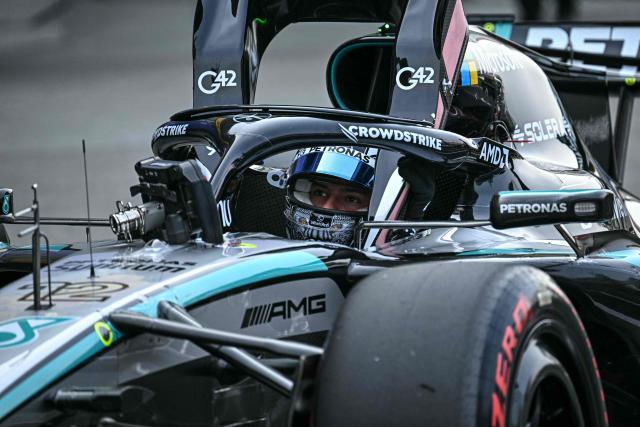 Mercedes' Italian driver Kimi Antonelli parks his car after the qualifying session ahead of the Formula One Japanese Grand Prix at the Suzuka circuit in Suzuka, Mie prefecture on March 28, 2026. (Photo by Philip FONG / AFP)
