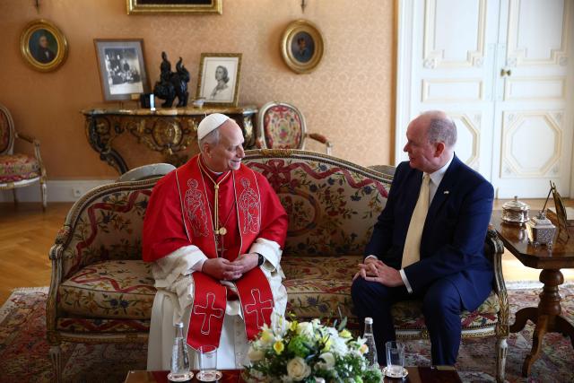 Pope Leo XIV meets with Prince Albert II of Monaco during a private audience in the Prince's Palace of Monaco in Monte Carlo, Monaco, on March 28, 2026. Pope Leo XIV heads to the Mediterranean principality of Monaco on the French Riviera that is the pontiff's surprise pick for the first western European trip of his papacy. The US-born pope, a former missionary critical of the wealthy elite, will helicopter in for a day in the world's second-smallest state, best known for its casinos, luxury yachts and Michelin-starred dining. (Photo by Guglielmo Mangiapane / POOL / AFP)