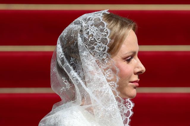 Princess Charlene De Monaco waits for the arrival of the Pope to meet with members of the catholic community in the Cathedral of the Immaculate Conception in Monte Carlo, Monaco, on March 28, 2026. Pope Leo XIV heads to the Mediterranean principality of Monaco on the French Riviera that is the pontiff's surprise pick for the first western European trip of his papacy. The US-born pope, a former missionary critical of the wealthy elite, will helicopter in for a day in the world's second-smallest state, best known for its casinos, luxury yachts and Michelin-starred dining. (Photo by Valery HACHE / AFP)