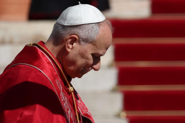 Pope Leo XIV arrives to meet with members of the catholic community in the Cathedral of the Immaculate Conception in Monte Carlo, Monaco, on March 28, 2026. Pope Leo XIV heads to the Mediterranean principality of Monaco on the French Riviera that is the pontiff's surprise pick for the first western European trip of his papacy. The US-born pope, a former missionary critical of the wealthy elite, will helicopter in for a day in the world's second-smallest state, best known for its casinos, luxury yachts and Michelin-starred dining. (Photo by Valery HACHE / AFP)