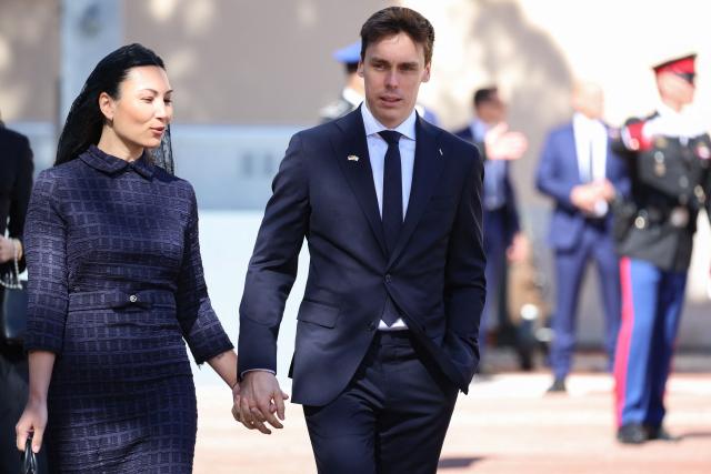 Son of Stephanie of Monaco Louis Ducruet, his wife Marie Chevallier leave after a welcome ceremony for the Pope in the Prince's Palace of Monaco in Monte Carlo, Monaco, on March 28, 2026. Pope Leo XIV heads to the Mediterranean principality of Monaco on the French Riviera that is the pontiff's surprise pick for the first western European trip of his papacy. The US-born pope, a former missionary critical of the wealthy elite, will helicopter in for a day in the world's second-smallest state, best known for its casinos, luxury yachts and Michelin-starred dining. (Photo by Valery HACHE / AFP)