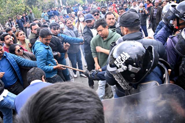 Supporters protest against the arrest of Nepali former prime minister KP Sharma Oli in Kathmandu on March 28, 2026. Nepal's former prime minister KP Sharma Oli and ex-home minister Ramesh Lekhak were arrested March 28 over their alleged involvement in a deadly crackdown on protestors in September, police said. (Photo by PRAKASH MATHEMA / AFP)