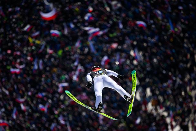 Poland’s Kamil Stoch competes during the trial round of the Men Team Flying Hill competition of the FIS Ski Jumping World Cup in Planica, Slovenia on March 28, 2026. (Photo by Jure Makovec / AFP)