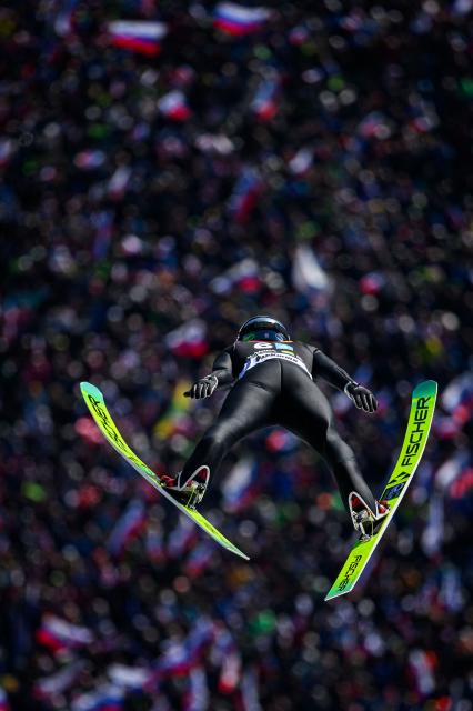 Japan’s Ren Nikaido competes during the first round of the Men Team Flying Hill competition of the FIS Ski Jumping World Cup in Planica, Slovenia on March 28, 2026. (Photo by Jure Makovec / AFP)