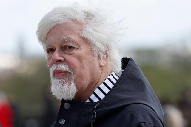 Canadian-American environmental activist and Sea Shepherd Conservation Society founder Paul Watson arrives ahead of a demonstration at the Trocadero to denounce incidental catches of dolphins and other marine species in non-selective fishing nets in the Bay of Biscay, in Paris on March 28, 2026. (Photo by Sebastien DUPUY / AFP)