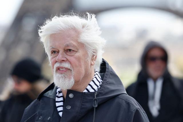 Canadian-American environmental activist and Sea Shepherd Conservation Society founder Paul Watson arrives ahead of a demonstration at the Trocadero to denounce incidental catches of dolphins and other marine species in non-selective fishing nets in the Bay of Biscay, in Paris on March 28, 2026. (Photo by Sebastien DUPUY / AFP)