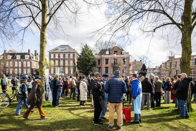 Protesters participate in a 'No Tyrants' demonstration in front of the US Consulate in Amsterdan on March 28, 2026, in solidarity with the anti-Trump (No Kings) demonstrations taking place throughout the US. (Photo by Dingena Mol / ANP / AFP) / Netherlands OUT