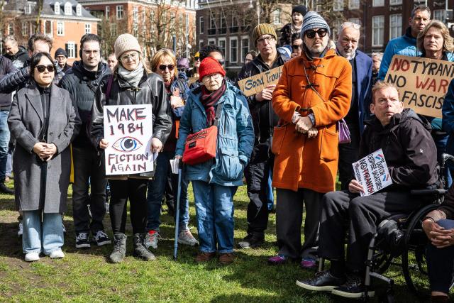 Protesters participate in a 'No Tyrants' demonstration in front of the US Consulate in Amsterdan on March 28, 2026, in solidarity with the anti-Trump (No Kings) demonstrations taking place throughout the US. (Photo by Dingena Mol / ANP / AFP) / Netherlands OUT