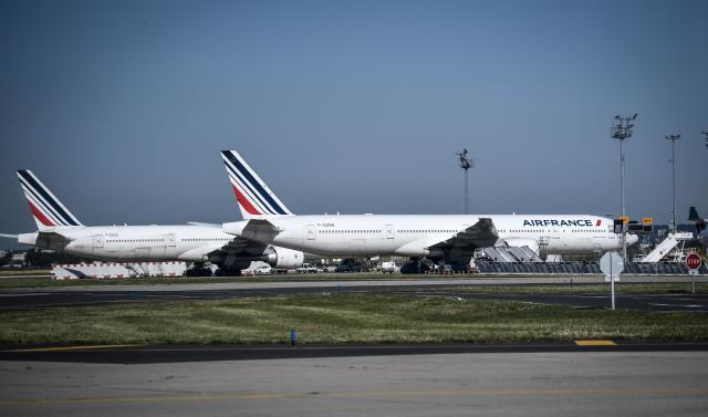 (FILES) A photograph taken on June 24, 2020, shows Air France planes parked on the tarmac at the Terminal 3 of the Orly airport, in Orly on the outskirts of Paris, a few days before its reopening as France eases lockdown measures taken to curb the spread of the COVID-19 (the novel coronavirus). Air France is leaving Paris Orly Airport on March 28, 2026 to refocus its operations on Roissy Paris-Charles de Gaulle Airport, which will continue to serve routes to Nice, Toulouse and Marseille. The last flight bearing the French airlines livery is a Nice-Paris service due to land at Orly at 9.55 pm, Air France told AFP. (Photo by STEPHANE DE SAKUTIN / AFP)