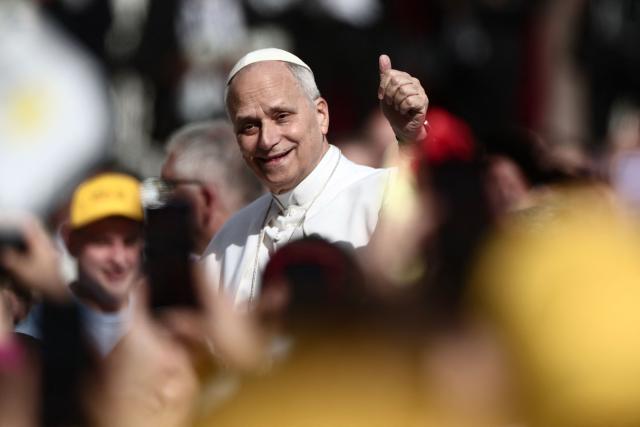 Pope Leo XIV arrives to lead a Holy Mass at the Louis II Stadium in Monaco, on March 28, 2026. Pope Leo XIV heads to the Mediterranean principality of Monaco on the French Riviera that is the pontiff's surprise pick for the first western European trip of his papacy. The US-born pope, a former missionary critical of the wealthy elite, will helicopter in for a day in the world's second-smallest state, best known for its casinos, luxury yachts and Michelin-starred dining. (Photo by Thibaud MORITZ / AFP)