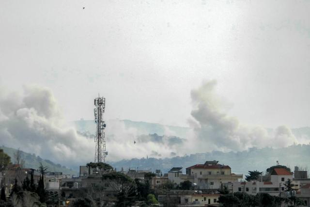 Smoke rises following an Israeli airstrike on the village of Taybeh in southern Lebanon as seen from nearby Marjeyoun on March 28, 2026. Lebanon was drawn into the Middle East war last week when Iran-backed militant group Hezbollah attacked Israel in response to the killing of the Iranian supreme leader during US-Israeli strikes on February 28. (Photo by AFP) / Attention editors: AFP covers the war in the Middle East through its extensive regional network, including bureaus in Tehran, Jerusalem, and several neighboring countries. Since the start of the conflict, journalists have been working under increasingly restrictive conditions. Authorities in several countries have limited reporters' movements, photo and live video coverage from sensitive locations. Some governments and armed groups have banned images of missile or drone strikes and other security-related sites. / 