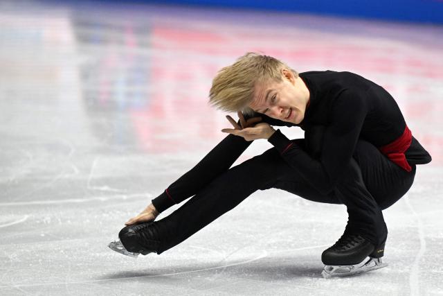 Italy’s Daniel Grassl performs during the men's free skating program of the 2026 ISU Figure Skating World Championships in Prague, Czech Republic on March 28, 2026. (Photo by Michal Cizek / AFP)