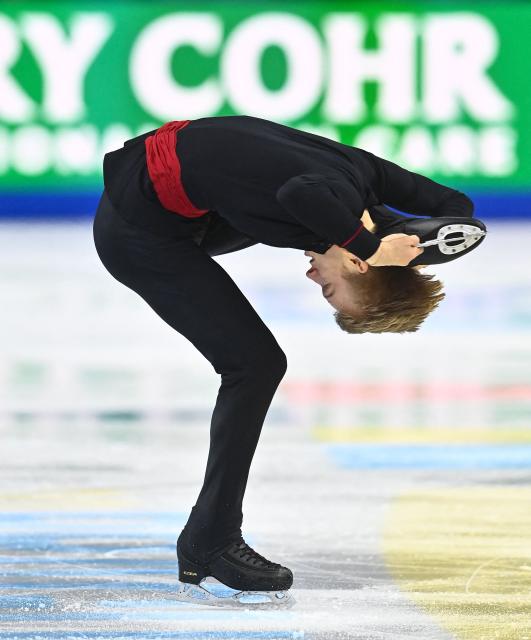 Italy’s Daniel Grassl performs during the men's free skating program of the 2026 ISU Figure Skating World Championships in Prague, Czech Republic on March 28, 2026. (Photo by Michal Cizek / AFP)