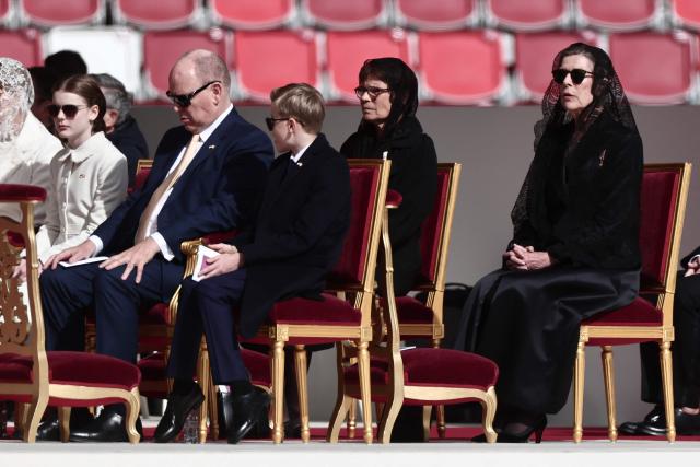 Princess Charlene of Monaco (L), Prince's Albert II of Monaco, his sisters Caroline of Hanover Caroline of Monaco (R) and Stephanie of Monaco and Prince's Jacques of Monaco arrive for a Holy Mass by Pope Leo XIV at the Louis II Stadium in Monaco, on March 28, 2026. Pope Leo XIV denounced the widening gap between the haves and have-nots as he visited Monaco, a millionaires' playground that is the surprise pick for the first western European trip of his papacy. (Photo by Thibaud MORITZ / AFP)