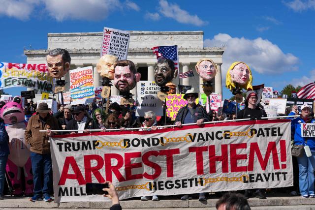 Demonstrators hold effigies of Trump administration officials as they gather at the Lincoln Memorial during the "No Kings" national day of protest in Washington, DC, on March 28, 2026. Nationwide protests against US President Donald Trump are expected Saturday as millions of people vent fury over what they see as his authoritarian bent and other forms of cruel, law-trampling governance. It is the third time in less than a year that Americans will take to the streets as part of a grassroots movement called "No Kings," the most vocal and visual conduit for opposition to Trump since he began his second term in January 2025. (Photo by Ken Cedeno / AFP)