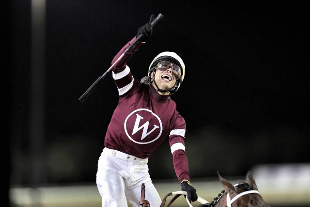 Jockey #2 Jose Ortiz reacts as he wins Race 9 during the Dubai World Cup horse race in Dubai on March 28, 2026. Since the United States and Israel began striking Iran on February 28, Tehran has launched waves of missiles and drones at Gulf states, with more than 2,000 attacks on the UAE alone. (Photo by Fadel SENNA / AFP)