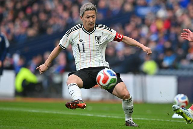 Japan's forward Daizen Maeda controls the ball during the friendly International football match between Scotland and Japan at Hampden Park, in Glasgow, on March 28, 2026. (Photo by ANDY BUCHANAN / AFP)