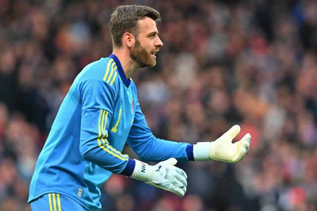Scotland's goalkeeper #01 Angus Gunn gestures during the friendly International football match between Scotland and Japan at Hampden Park, in Glasgow, on March 28, 2026. (Photo by ANDY BUCHANAN / AFP)