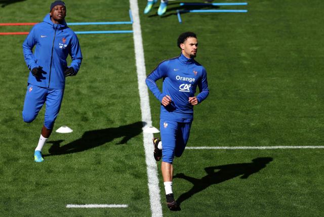 France's midfielder #18 Warren Zaire Emery (R) takes part a training session at the  Northwest Stadium in Landover, Maryland, on March 28, 2026 on the eve of the friendly football match between Colombia and France. France will play against Colombia in an international friendly football match on March 29, 2026, in preparation for the upcoming FIFA World Cup. (Photo by FRANCK FIFE / AFP)