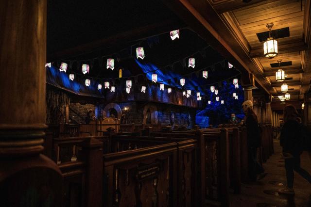 Guests walk through the 'Frozen Ever After' attraction at Disney Adventure World ahead of the 'World of Frozen' opening in Disneyland Paris in Marne-la-Vallee, east of Paris on March 28, 2026. 'World of Frozen' will open on March 29, 2026. (Photo by Blanca CRUZ / AFP)