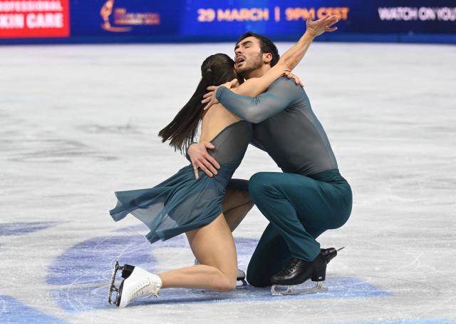 France's Laurence Fournier Beaudry and Guillaume Cizeron perform during the Ice Dance Free Dance program of the 2026 ISU Figure Skating World Championships in Prague, Czech Republic on March 28, 2026. (Photo by Michal Cizek / AFP)
