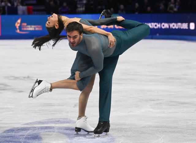 France's Laurence Fournier Beaudry and Guillaume Cizeron perform during the Ice Dance Free Dance program of the 2026 ISU Figure Skating World Championships in Prague, Czech Republic on March 28, 2026. (Photo by Michal Cizek / AFP)
