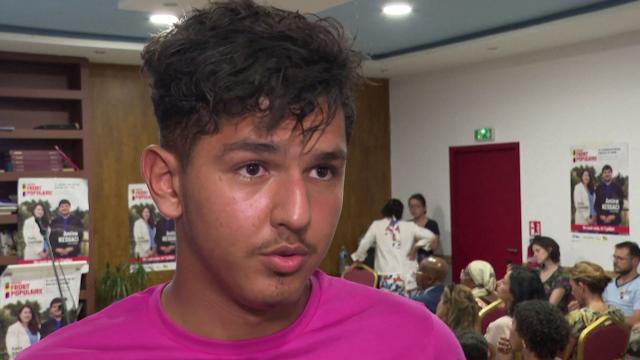 (FILES) This video grab made on November 14, 2025 from an AFP footage dated July 7, 2024 shows Mehdi Kessaci, brother of Amine Kessaci, founder of the association Conscience and former candidate in the 3rd constituency of the Bouches-du-Rhone department for the left-wing Nouveau Front Populaire (NFP) coalition. Six people have been formally charged and remanded in custody in the investigation into the murder of Mehdi Kessaci in Marseille, whose brother Amine, a prominent figure in the fight against drug trafficking, was elected deputy mayor, the national prosecutor for organized crime announced on March 28, 2026. Mehdi Kessaci, aged 20, was shot dead in Marseille, southern France, on November 13, 2025. (Photo by Jeremy MARTIN and Maxime CONCHON / AFP)